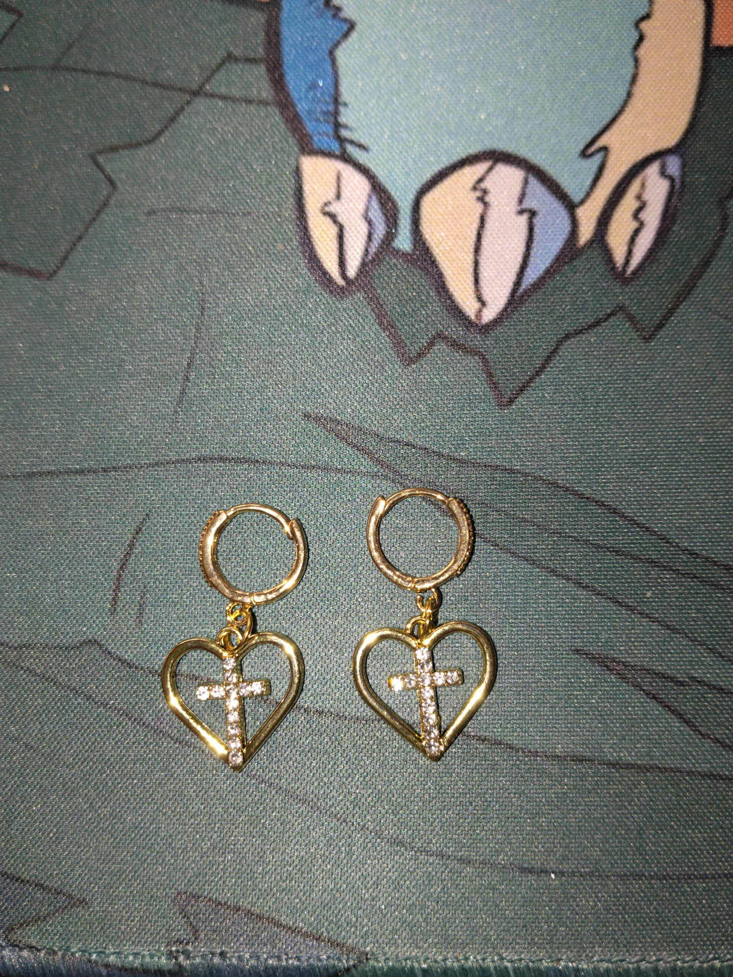 Boucle d'oreille croix en coeur