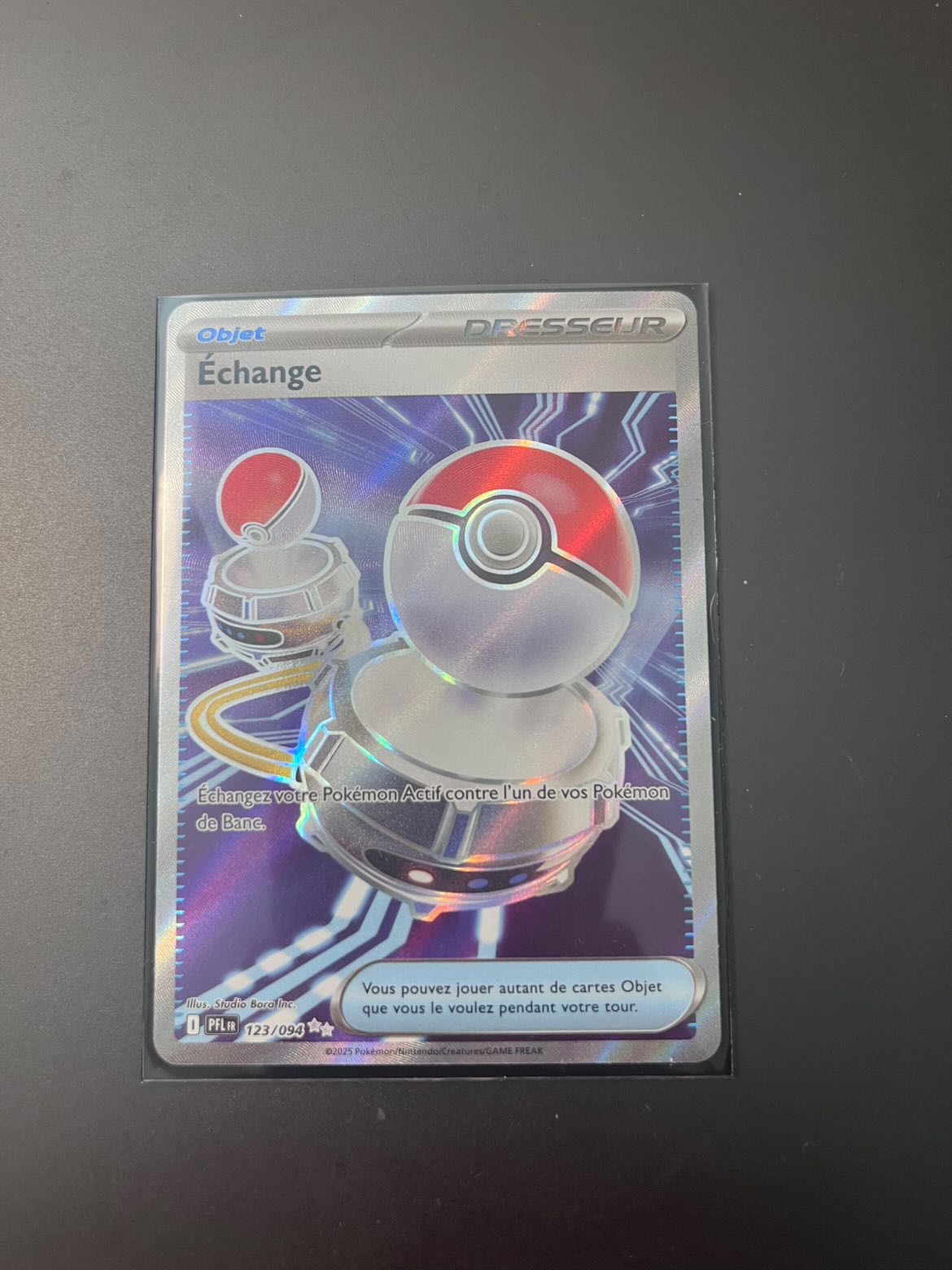 Carte Pokémon " Échange" de Flammes Fantasmagoriques